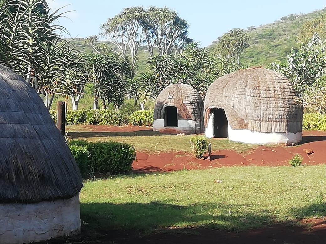 Mzamo's Cultural Village & Homestead kraal at sunset in Hluhluwe, KwaZulu-Natal